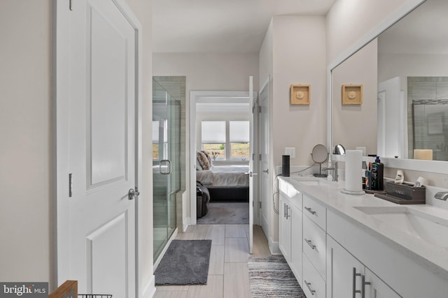 4387 Shakespeare Cir, White Plains, MD 20695 - bathroom featuring a stall shower, connected bathroom, double vanity, and french doors