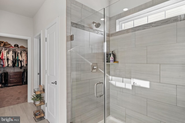 4387 Shakespeare Cir, White Plains, MD 20695 - full bathroom with a shower stall and a spacious closet