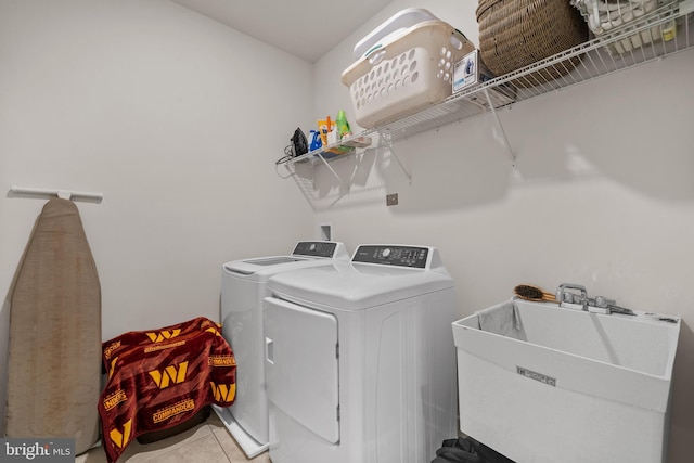 4387 Shakespeare Cir, White Plains, MD 20695 - laundry area featuring washer and dryer and tile patterned floors