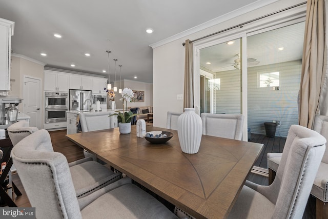 4387 Shakespeare Cir, White Plains, MD 20695 - dining space featuring crown molding, recessed lighting, dark wood-style floors, ceiling fan, and a chandelier