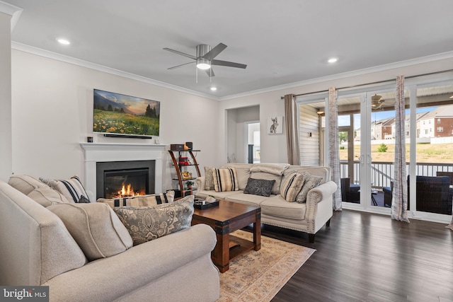 4387 Shakespeare Cir, White Plains, MD 20695 - living room with a glass covered fireplace, a ceiling fan, ornamental molding, dark wood-style floors, and french doors