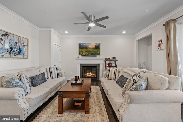 4387 Shakespeare Cir, White Plains, MD 20695 - living area with wood finished floors, ornamental molding, a ceiling fan, recessed lighting, and a glass covered fireplace