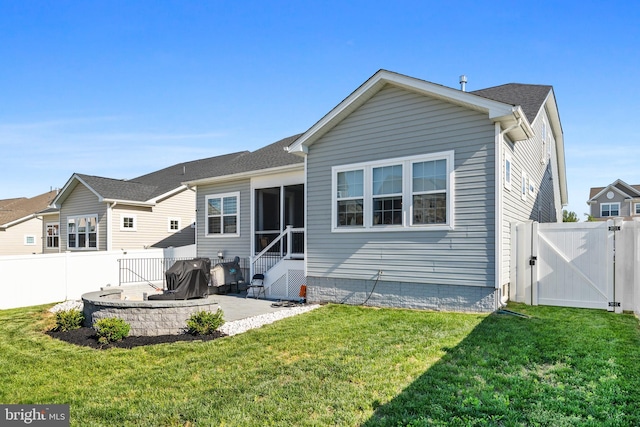 4387 Shakespeare Cir, White Plains, MD 20695 - rear view of property with a gate, a patio area, entry steps, and a sunroom