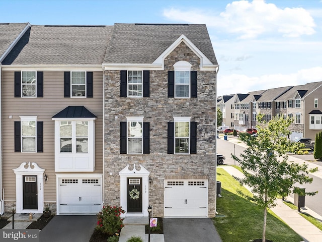 110 Fritillary Ct, Lake Frederick, VA 22630 - townhome / multi-family property featuring stone siding, a garage, and asphalt driveway