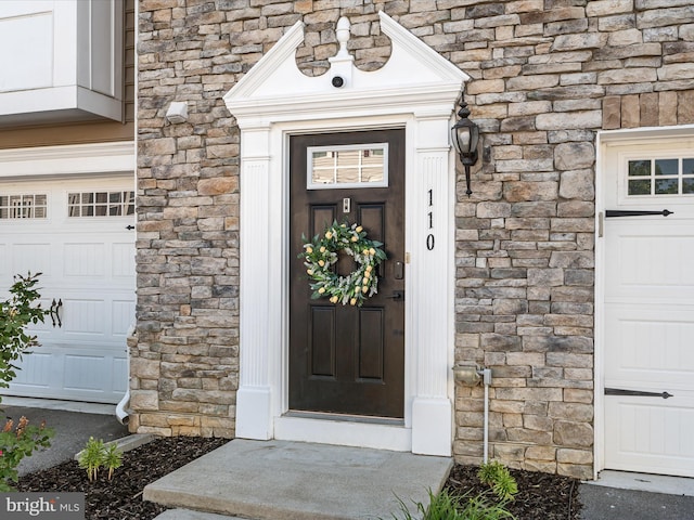 110 Fritillary Ct, Lake Frederick, VA 22630 - entrance to property with stone siding and a garage