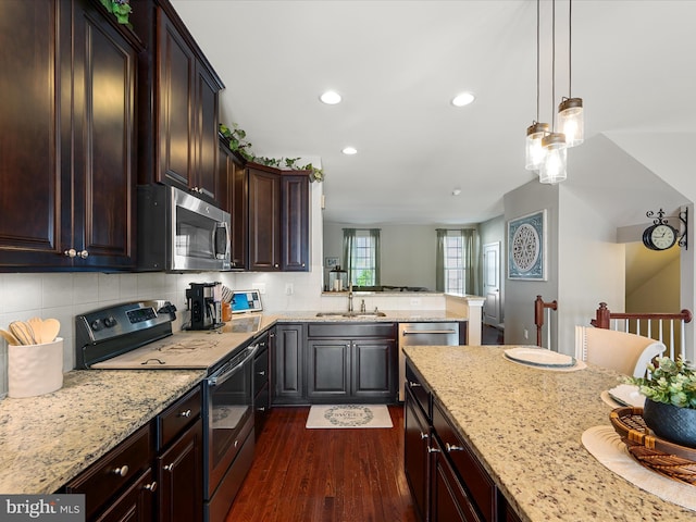 110 Fritillary Ct, Lake Frederick, VA 22630 - kitchen featuring appliances with stainless steel finishes, dark wood finished floors, recessed lighting, a sink, and light stone countertops