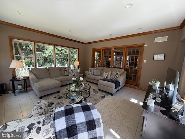 12534 Fawn Dr, Laurel, DE 19956 - living area featuring light tile patterned floors, french doors, ornamental molding, and recessed lighting