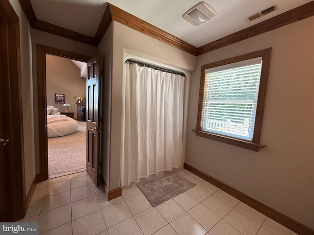 12534 Fawn Dr, Laurel, DE 19956 - corridor featuring crown molding and light tile patterned floors