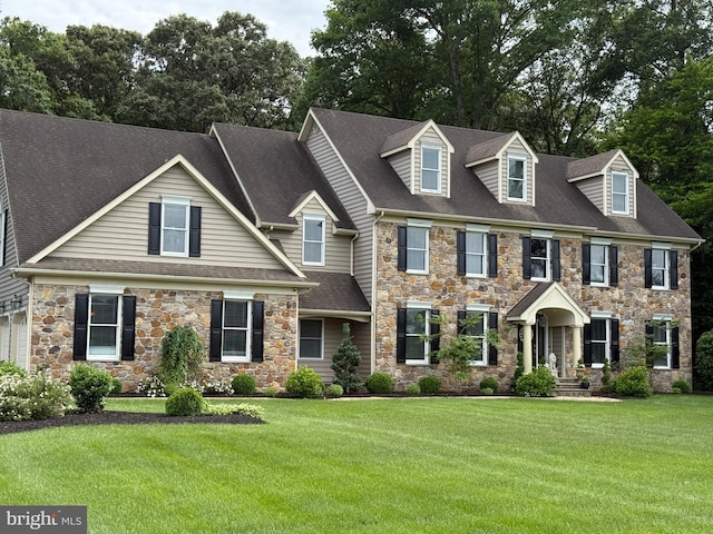 12534 Fawn Dr, Laurel, DE 19956 - view of front of home with stone siding, a front lawn, and roof with shingles