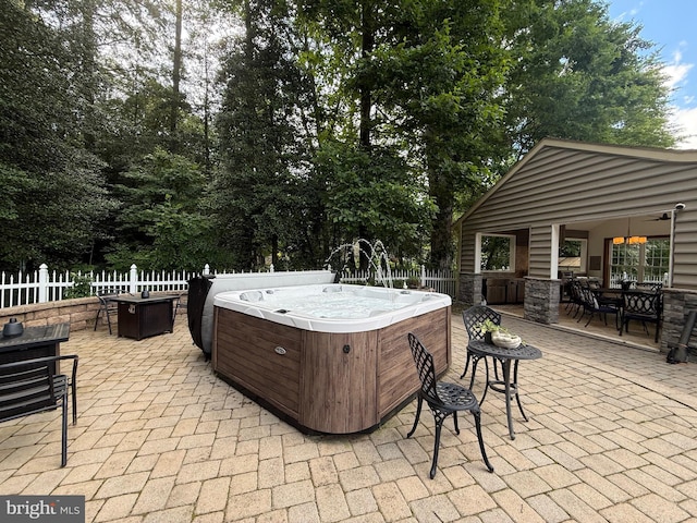 12534 Fawn Dr, Laurel, DE 19956 - view of patio / terrace featuring a hot tub and outdoor dining area