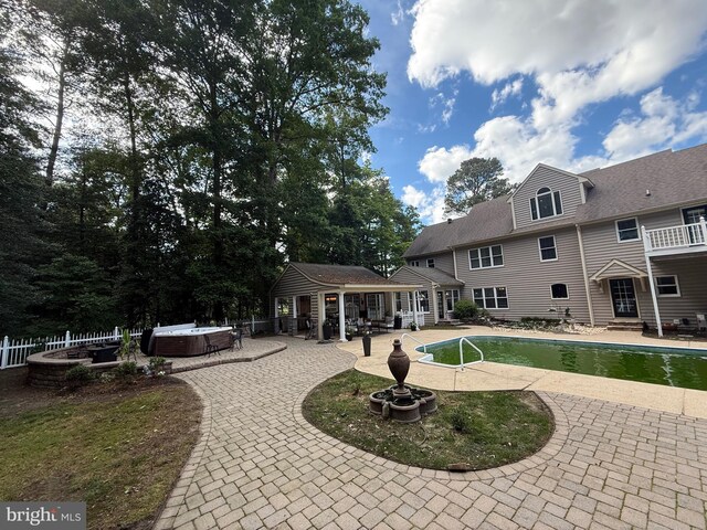 12534 Fawn Dr, Laurel, DE 19956 - outdoor pool featuring a hot tub and a patio
