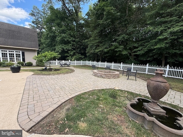 12534 Fawn Dr, Laurel, DE 19956 - view of patio / terrace with an outdoor fire pit