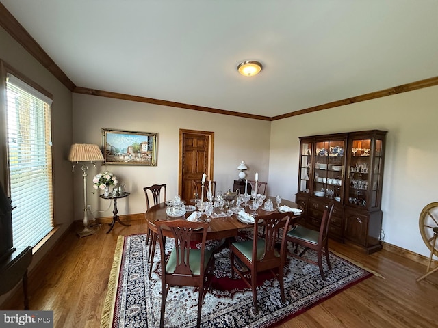 12534 Fawn Dr, Laurel, DE 19956 - dining area featuring crown molding, wood finished floors, and healthy amount of natural light