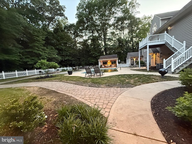 12534 Fawn Dr, Laurel, DE 19956 - view of yard with a patio, stairway, and an outbuilding