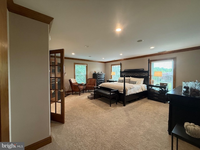12534 Fawn Dr, Laurel, DE 19956 - bedroom with crown molding, french doors, light carpet, and recessed lighting