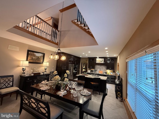 12534 Fawn Dr, Laurel, DE 19956 - dining room featuring a high ceiling and recessed lighting