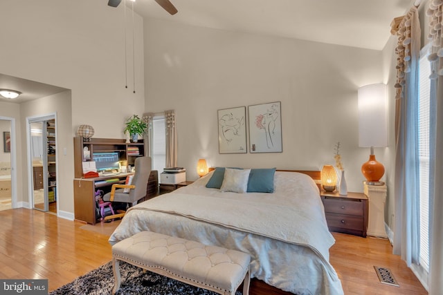7504 Walnut Hill Ln, Falls Church, VA 22042 - bedroom featuring wood finished floors, a towering ceiling, and ceiling fan