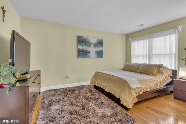 7504 Walnut Hill Ln, Falls Church, VA 22042 - bedroom featuring light wood finished floors