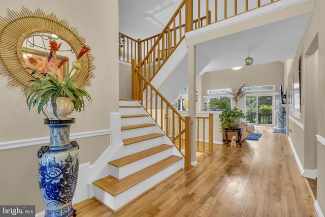 7504 Walnut Hill Ln, Falls Church, VA 22042 - entryway featuring wood finished floors and stairway