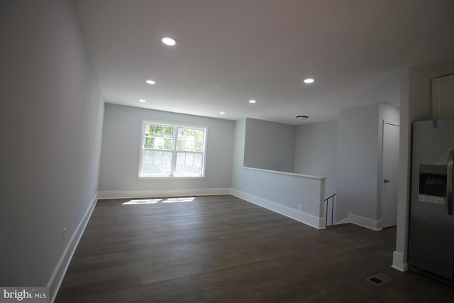 4713 Akron St, Temple Hills, MD 20748 - unfurnished room with dark wood-style floors, recessed lighting, and baseboards