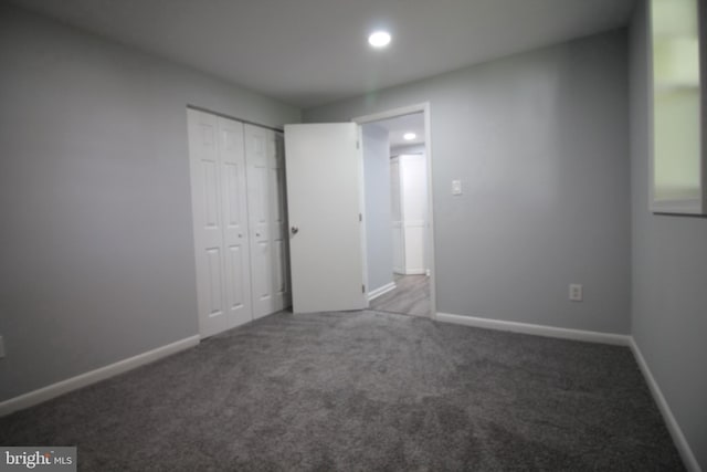 4713 Akron St, Temple Hills, MD 20748 - unfurnished bedroom with carpet, a closet, recessed lighting, and baseboards