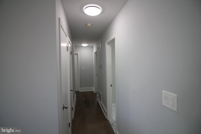 4713 Akron St, Temple Hills, MD 20748 - corridor with dark wood finished floors and baseboards
