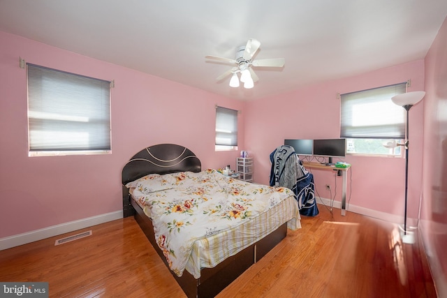 1200 Gainsboro Rd, Bala Cynwyd, PA 19004 - bedroom with baseboards, wood finished floors, and ceiling fan