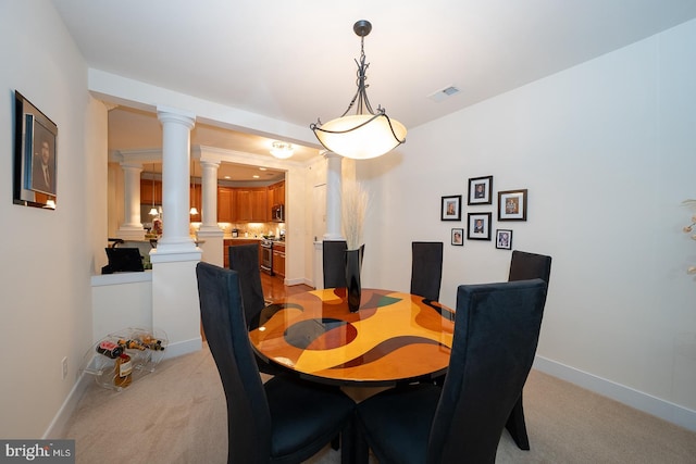 1322 Meridian Blvd Unit 1322, Warrington, PA 18976 - dining space featuring decorative columns, light carpet, and baseboards