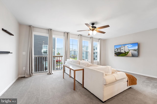 18216 Summit Pointe Dr, Triangle, VA 22172 - living area with carpet floors, ceiling fan, and baseboards