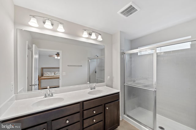 18216 Summit Pointe Dr, Triangle, VA 22172 - bathroom featuring double vanity, a stall shower, connected bathroom, a ceiling fan, and tile patterned flooring