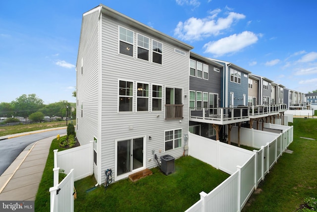 18216 Summit Pointe Dr, Triangle, VA 22172 - rear view of property with central AC
