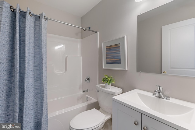 921 N Rose St, Baltimore, MD 21205 - full bathroom featuring toilet, vanity, and shower / bath combo with shower curtain