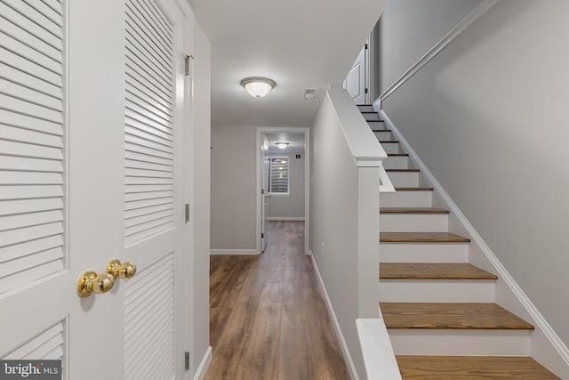 921 N Rose St, Baltimore, MD 21205 - stairway with wood finished floors and baseboards