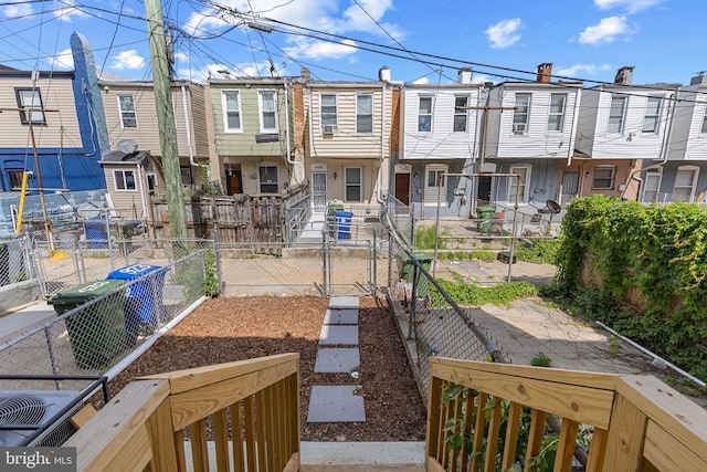 921 N Rose St, Baltimore, MD 21205 - rear view of house featuring a residential view