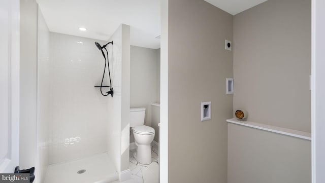 949 Marshall Dr, Warminster, PA 18974 - bathroom with marble finish floors, toilet, tiled shower, and baseboards