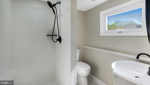 949 Marshall Dr, Warminster, PA 18974 - full bath featuring toilet, a tile shower, vanity, and marble finish flooring