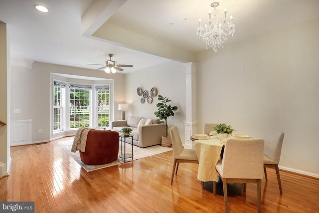 13943 Lullaby Rd, Germantown, MD 20874 - dining area with light wood-type flooring, baseboards, a ceiling fan, decorative columns, and recessed lighting