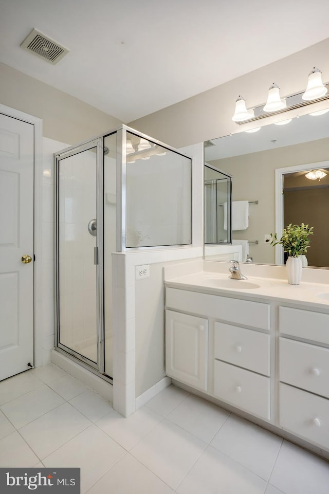 13943 Lullaby Rd, Germantown, MD 20874 - full bath featuring vanity, a stall shower, and tile patterned floors
