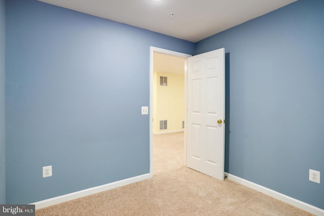 13943 Lullaby Rd, Germantown, MD 20874 - spare room with light carpet and baseboards