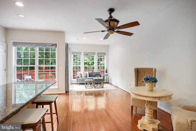 13943 Lullaby Rd, Germantown, MD 20874 - living area featuring light wood finished floors, baseboards, recessed lighting, and ceiling fan