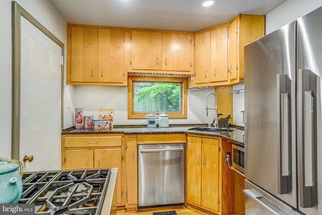 2005 S Quincy St, Arlington, VA 22204 - kitchen with stainless steel appliances, a sink, dark stone counters, and recessed lighting
