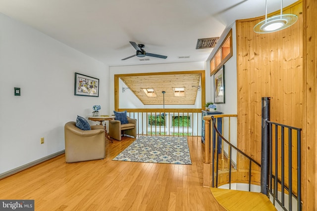 2005 S Quincy St, Arlington, VA 22204 - living area with ceiling fan, wood finished floors, and baseboards