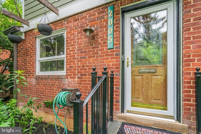 2005 S Quincy St, Arlington, VA 22204 - doorway to property with brick siding