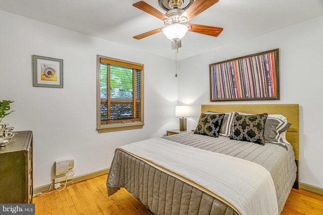 2005 S Quincy St, Arlington, VA 22204 - bedroom with baseboards, wood finished floors, and ceiling fan