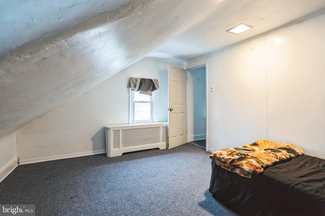 bonus room featuring vaulted ceiling and carpet flooring
