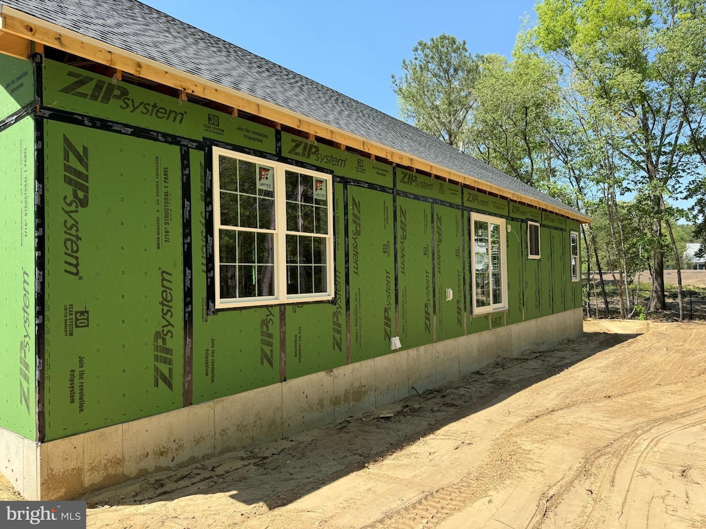 6474 Pleasant Dr, Laurel, DE 19956 - view of side of home featuring a shingled roof