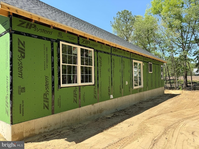 6474 Pleasant Dr, Laurel, DE 19956 - view of side of home featuring a shingled roof