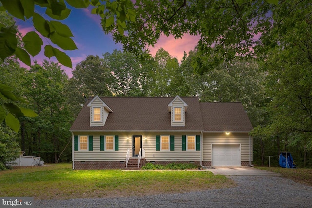 23115 Mt Cloud Rd, Bowling Green, VA 22427 - cape cod house with driveway, an attached garage, a yard, crawl space, and view of wooded area