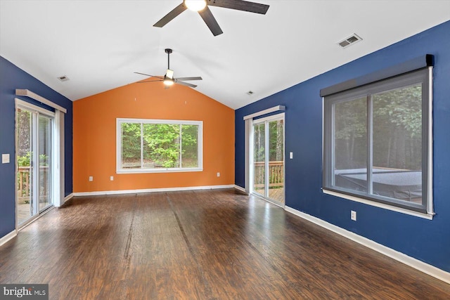 23115 Mt Cloud Rd, Bowling Green, VA 22427 - empty room featuring a ceiling fan, wood finished floors, vaulted ceiling, and baseboards