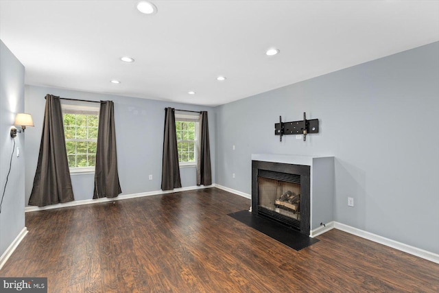 23115 Mt Cloud Rd, Bowling Green, VA 22427 - unfurnished living room with a fireplace with flush hearth, wood finished floors, baseboards, and recessed lighting